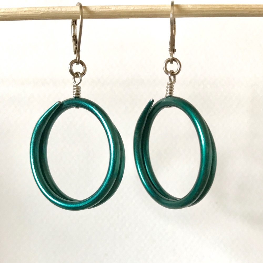 Hoop earrings made from vintage knitting needles.